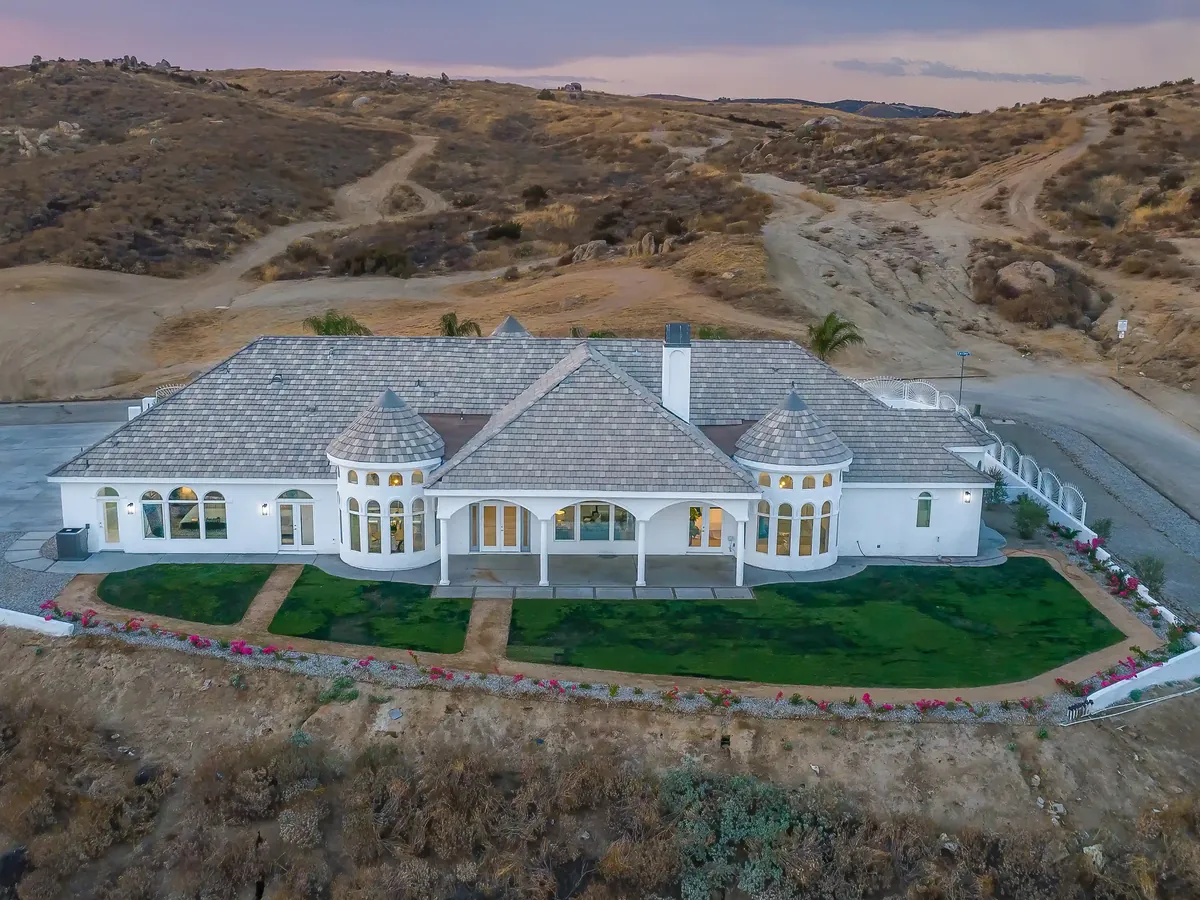 Whole tile roof of a single-story home seen from the air