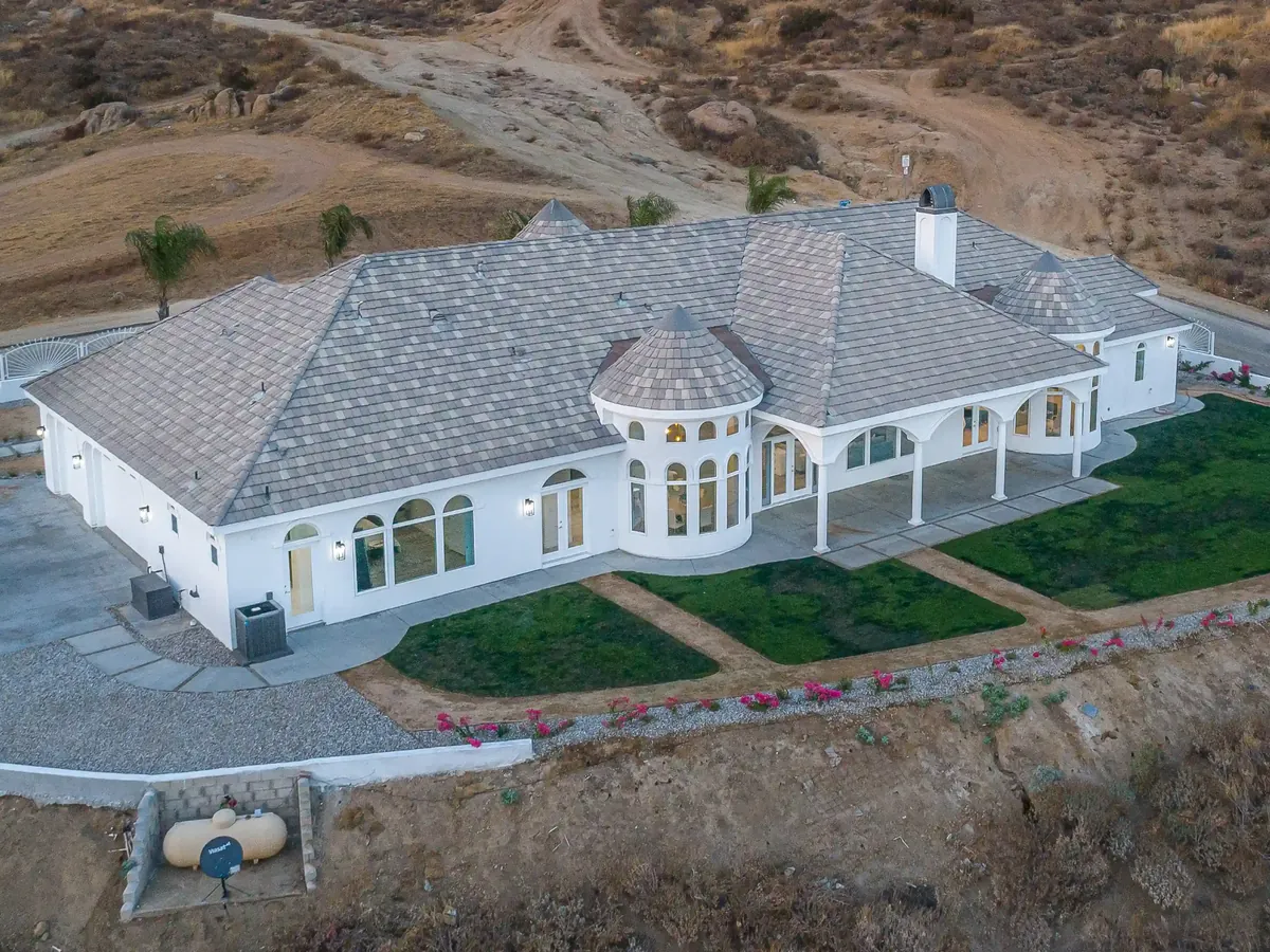 Tile roof covering a large single-story home, seen from above